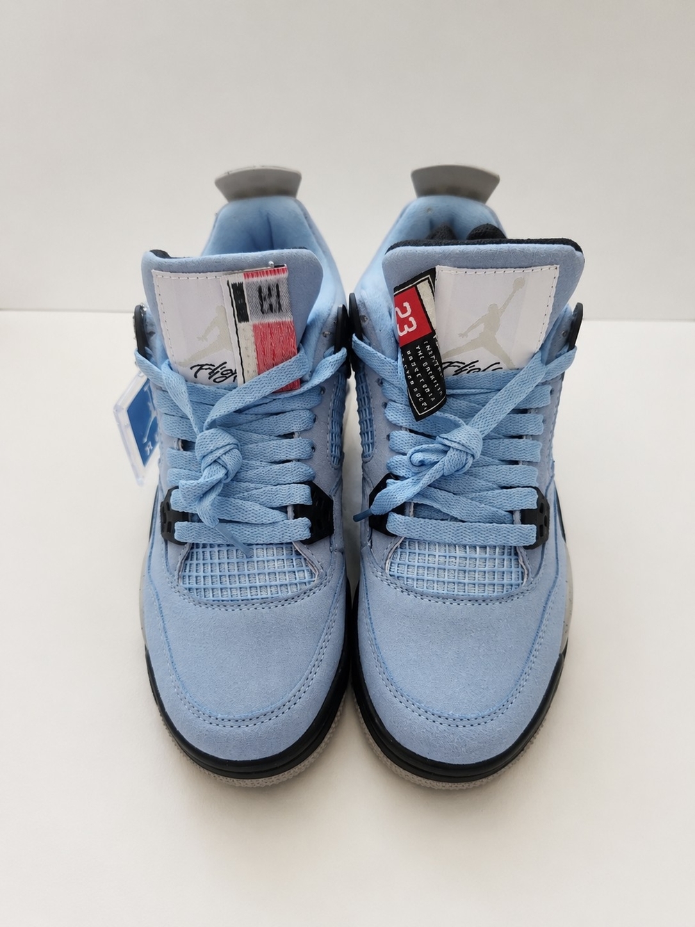 Air Jordan 4 Light Blue Suede Sneakers